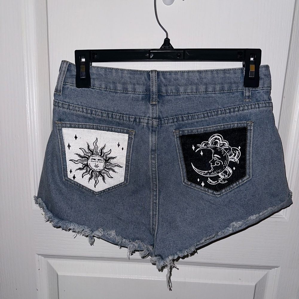 Shein brand shorts with moon and sun pattern on back pockets